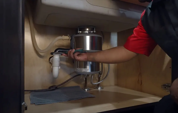 When to Call a Professional for a Leaky Kitchen Sink Repair?